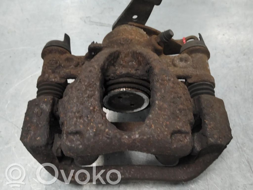 Opel Movano B Tylny zacisk hamulcowy 