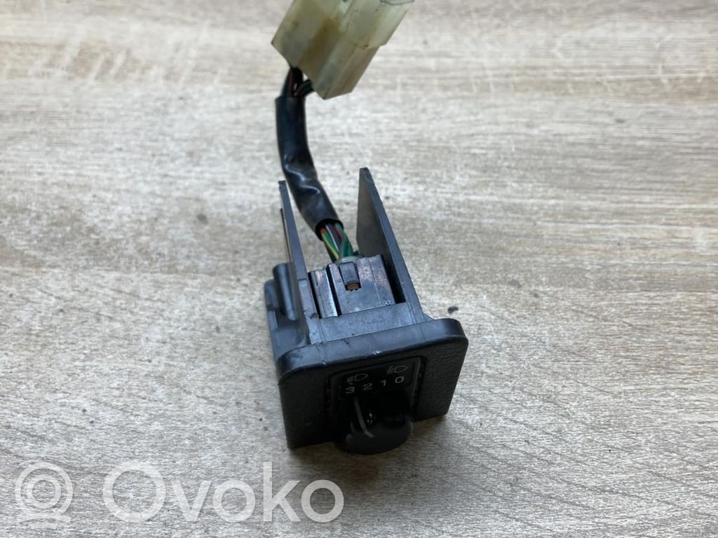 Headlight level height control switch