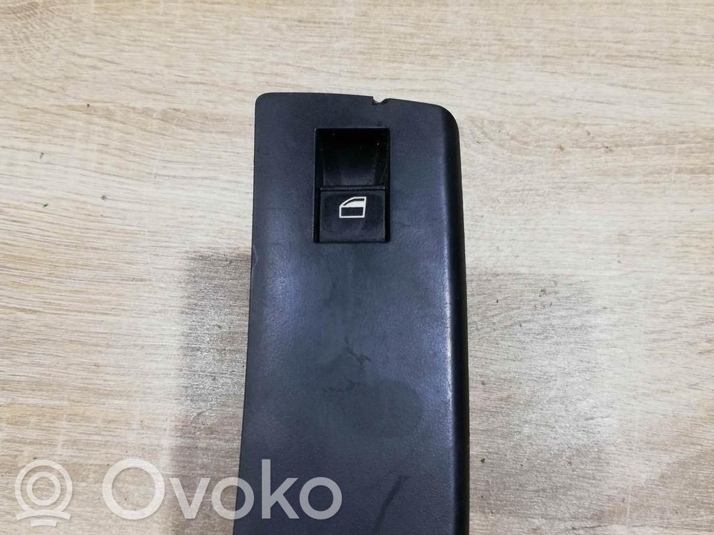 Electric window control switch   6952800