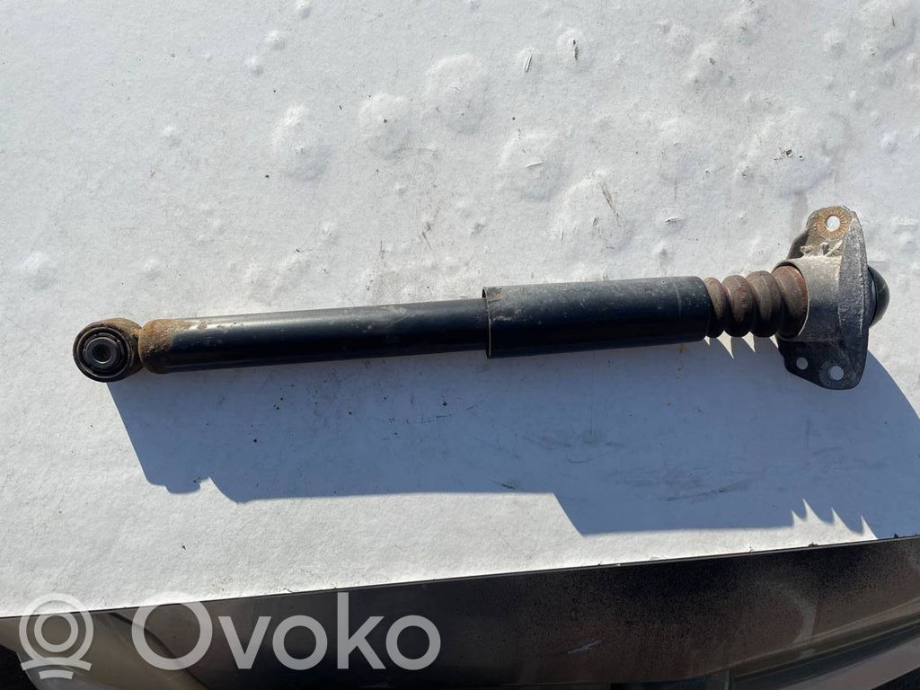 Volkswagen PASSAT B7 Amortyzator tylny 
