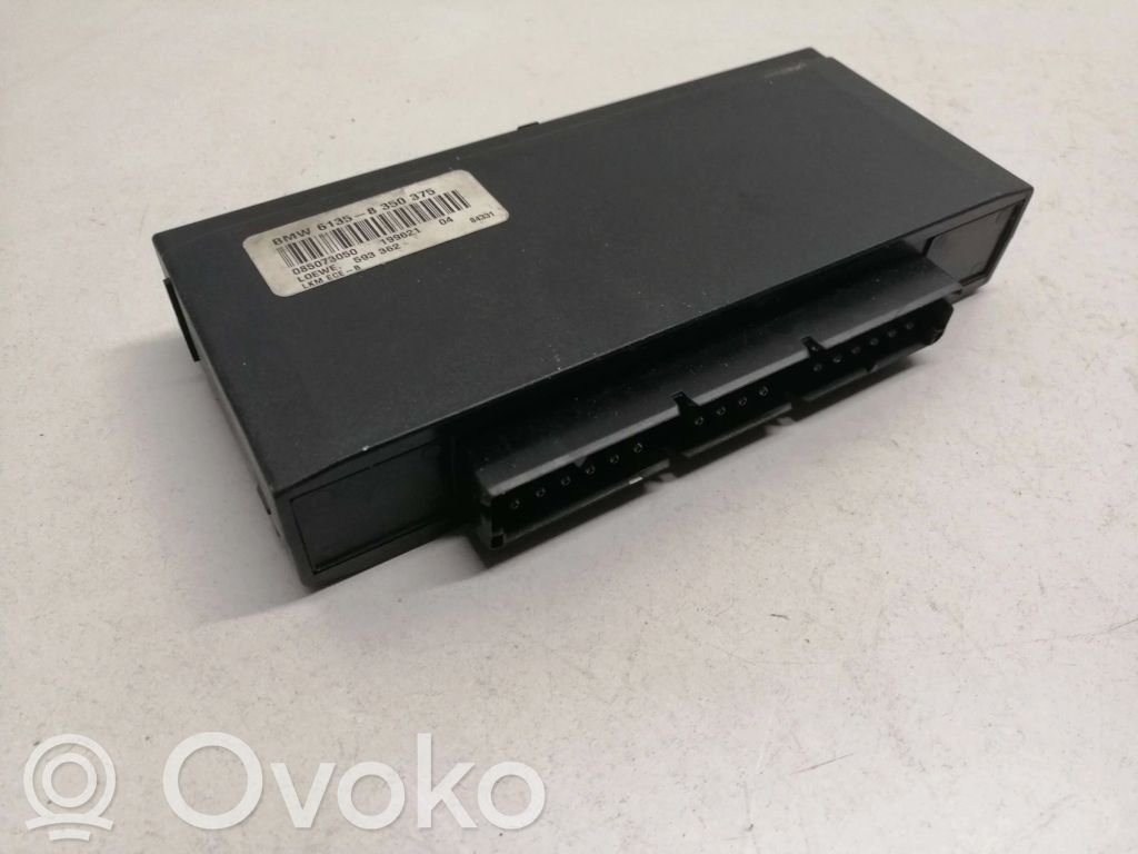 BMW 5 E34 Komforto modulis 
