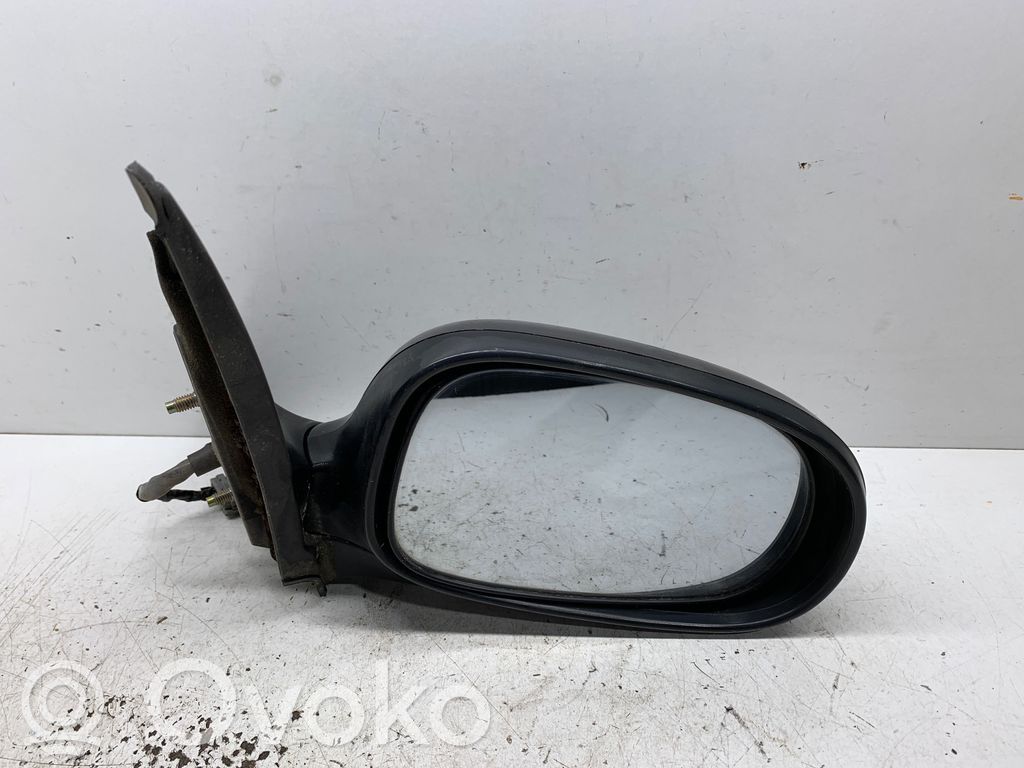 Nissan Almera N16 Front door electric wing mirror 