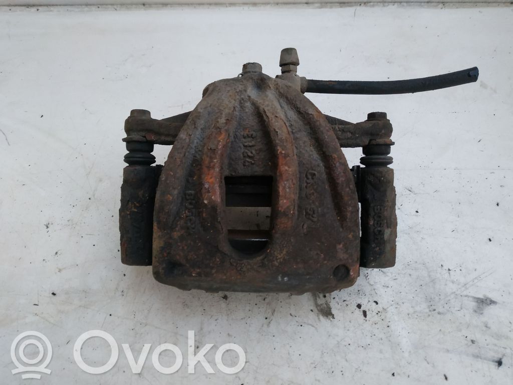 Toyota Avensis T250 Front brake caliper 