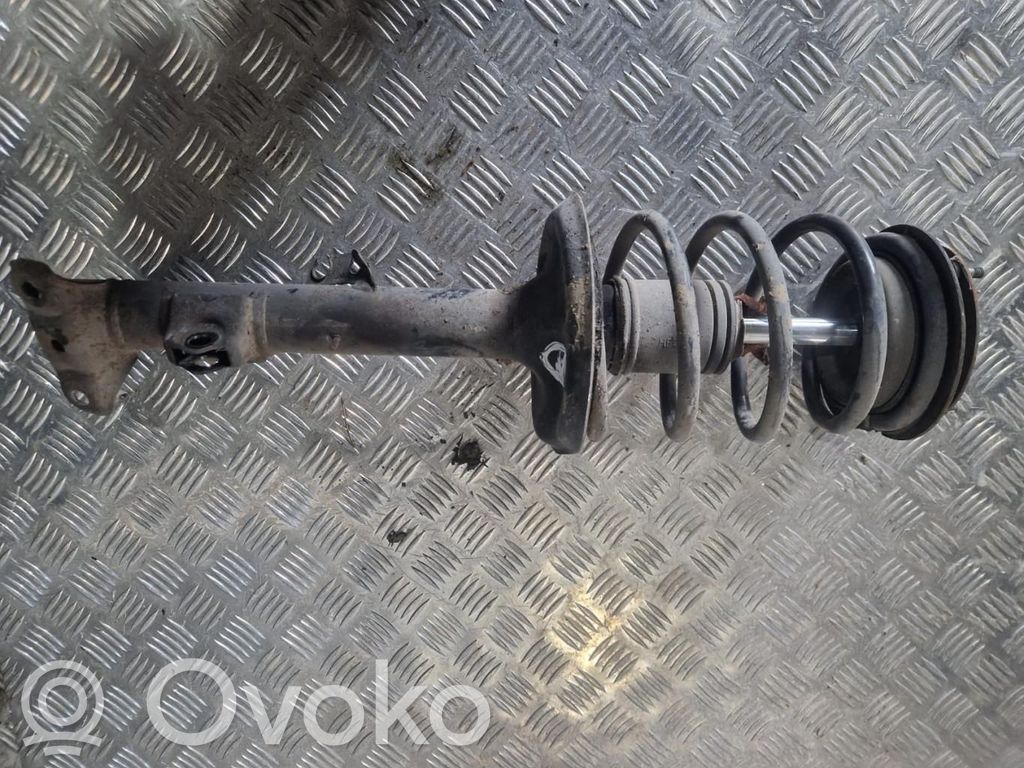 Front shock absorber with coil spring