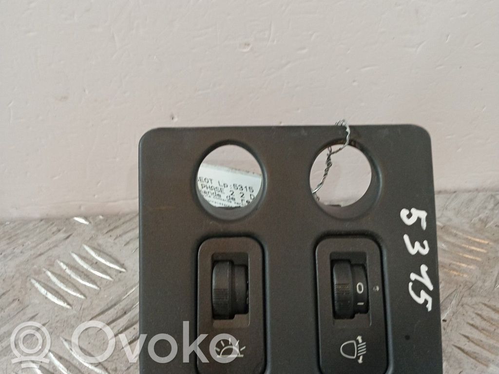 Headlight level height control switch   6552YK
