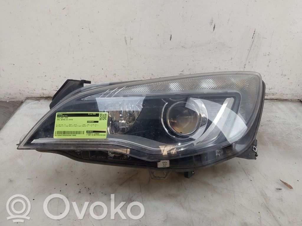 Opel Astra J Lampa przednia 