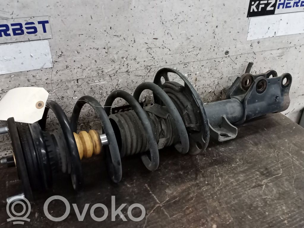 Mazda 6 Amortyzator osi przedniej ze sprężyną 