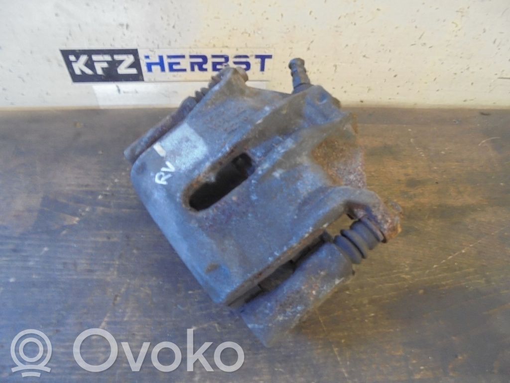 Peugeot 208 I Zacisk hamulcowy przedni 