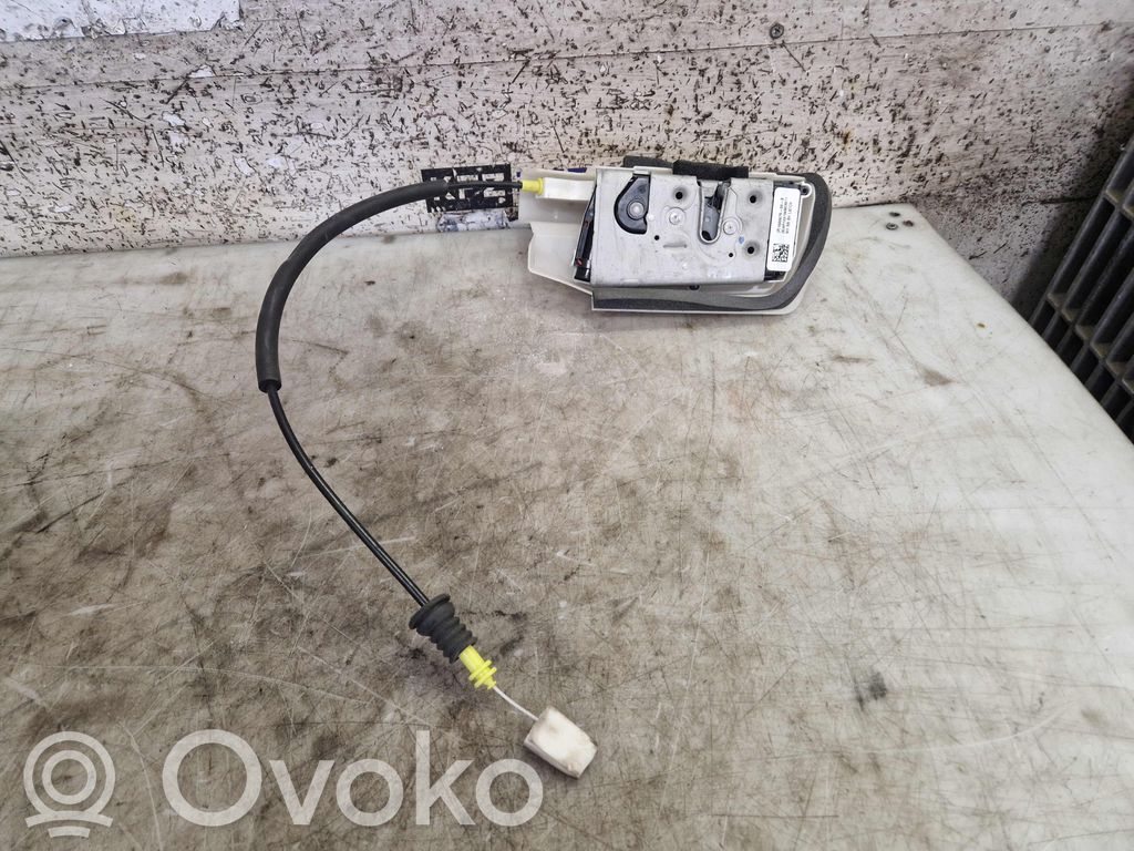 Tesla Model Y Takaoven lukko 