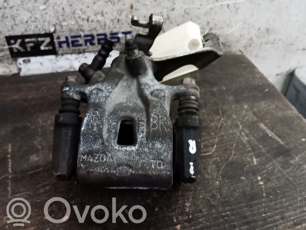 Mazda 6 Caliper del freno trasero 