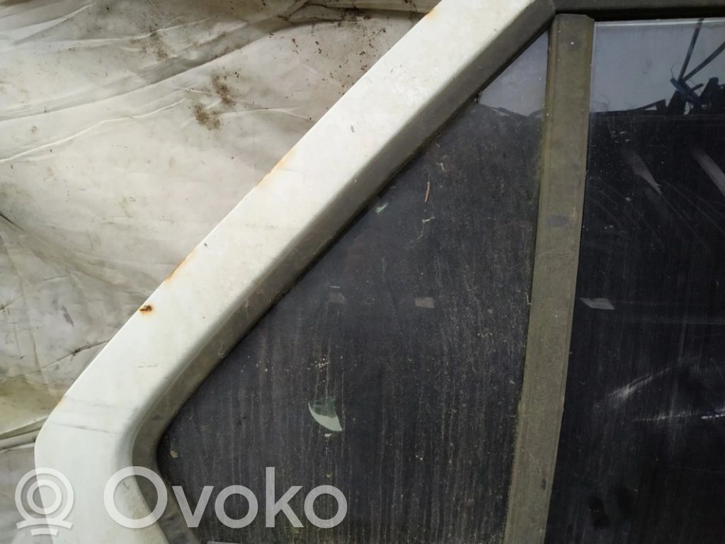 Ventanilla de ventilación de la puerta trasera