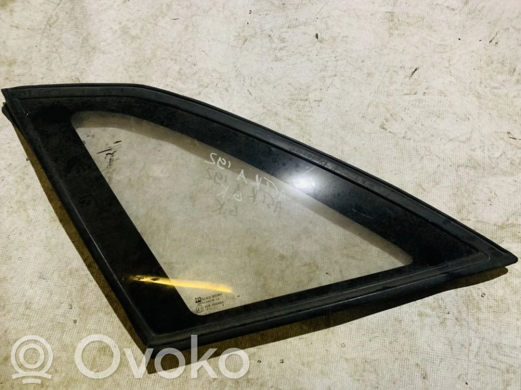 Vidrio lateral trasero