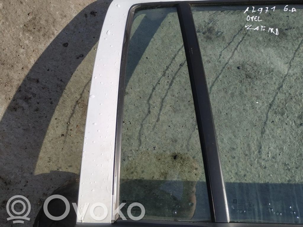 Ventanilla de ventilación de la puerta trasera