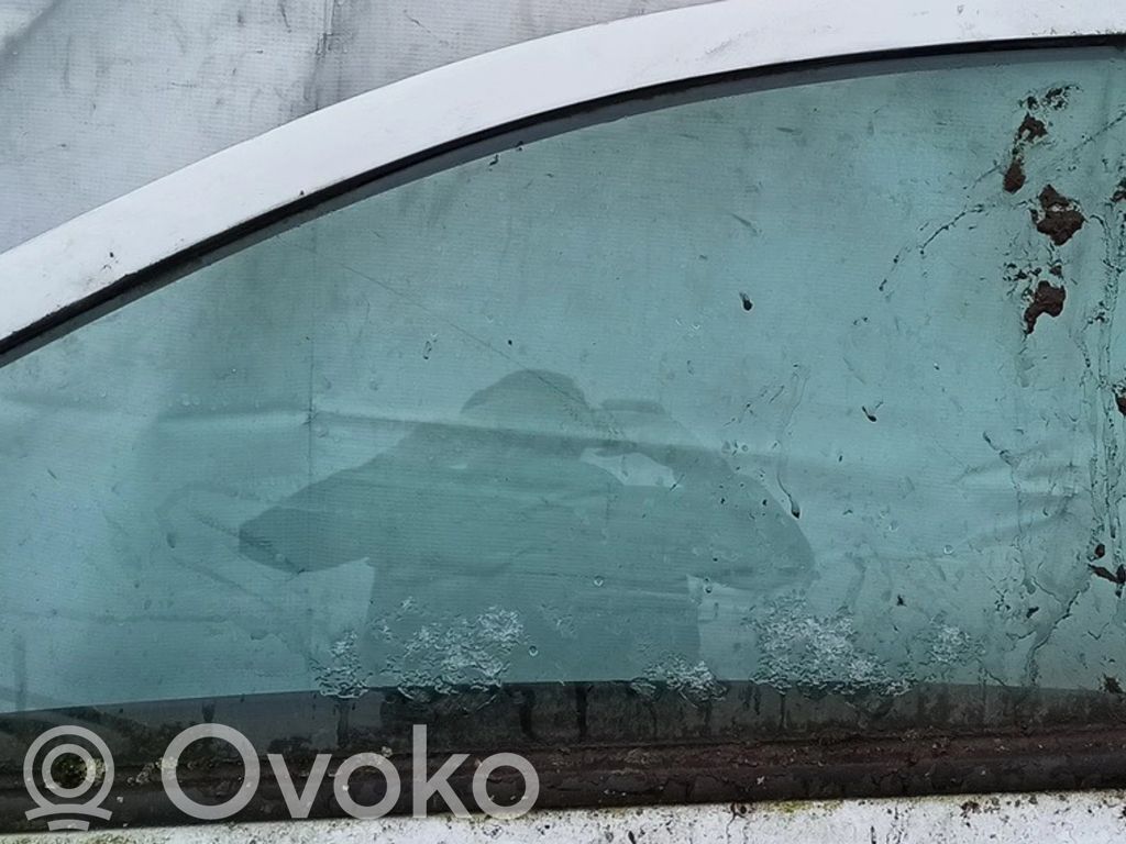 Opel Astra H Szyba drzwi przednich 
