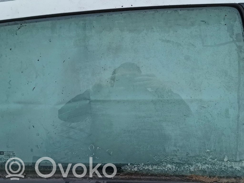 Opel Astra H Vitre de fenêtre porte arrière 