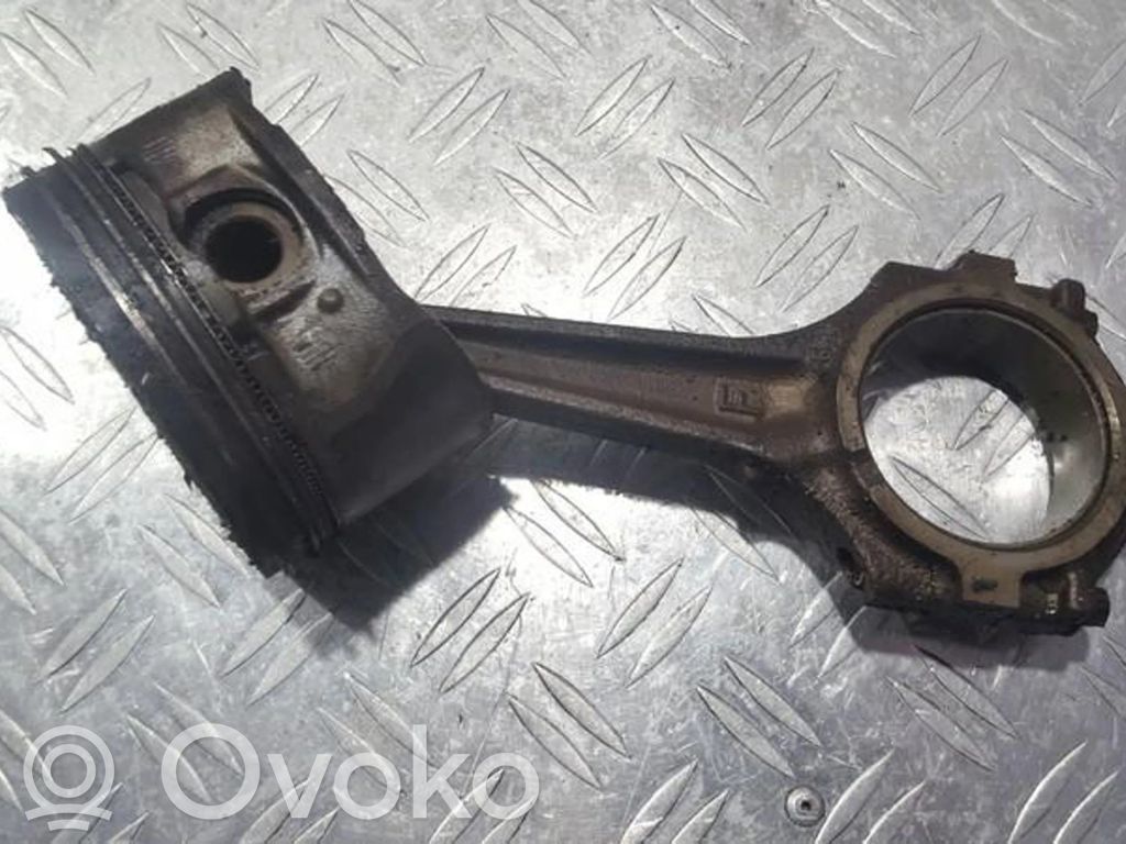 Piston with connecting rod