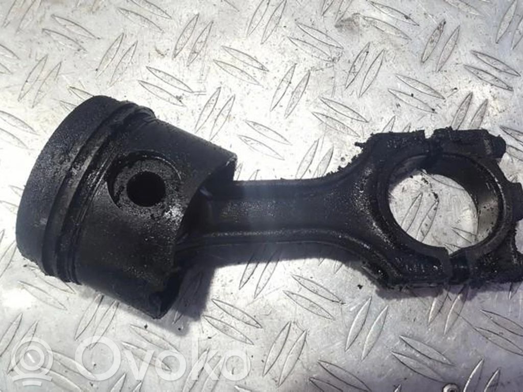 Piston with connecting rod