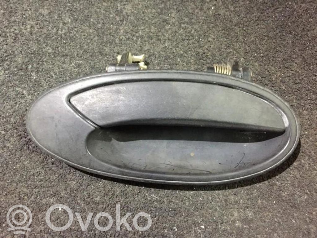 Mitsubishi Lancer Manecilla externa puerta delantera 