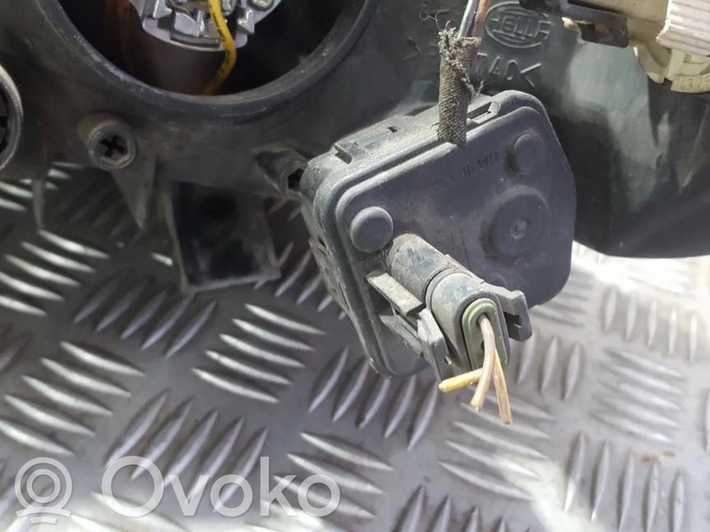 Opel Omega B1 Moteur de réglage du niveau des phares 