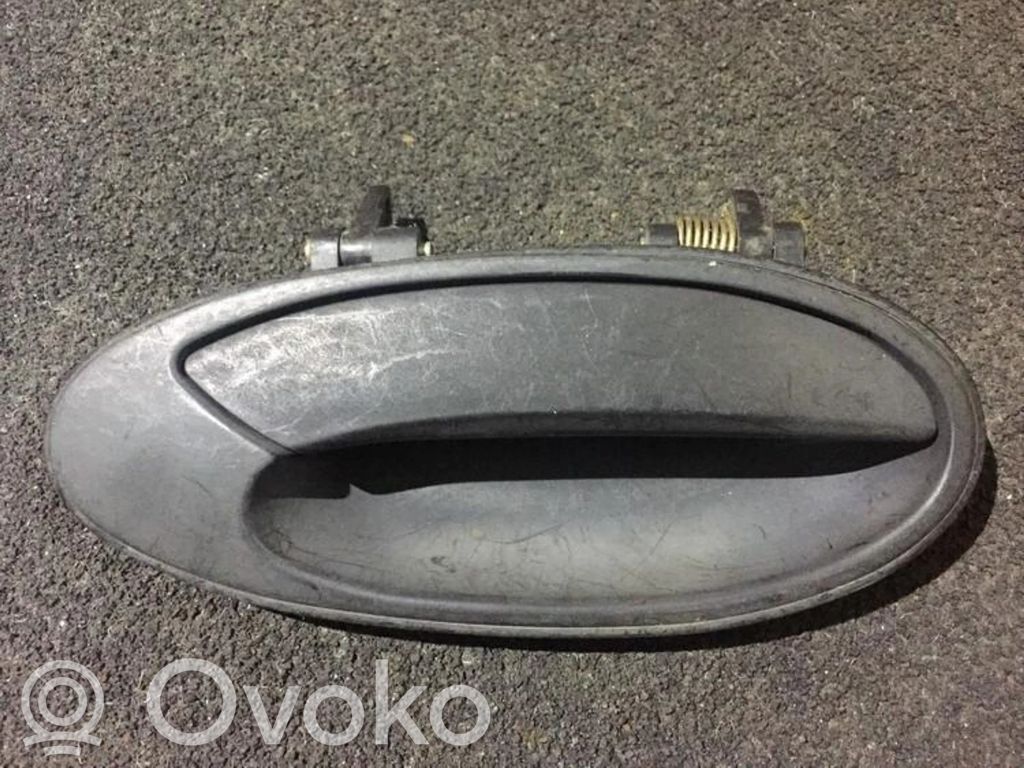 Mitsubishi Lancer Manecilla externa puerta delantera 