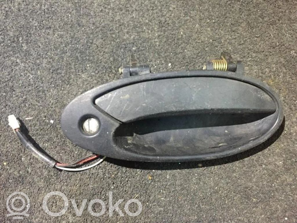 Mitsubishi Lancer Manecilla externa puerta delantera 