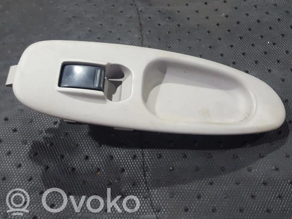 Nissan Almera Tino Ramka przycisków otwierania szyby drzwi przednich 