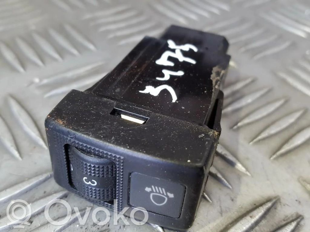 Bouton commande réglage hauteur de phares