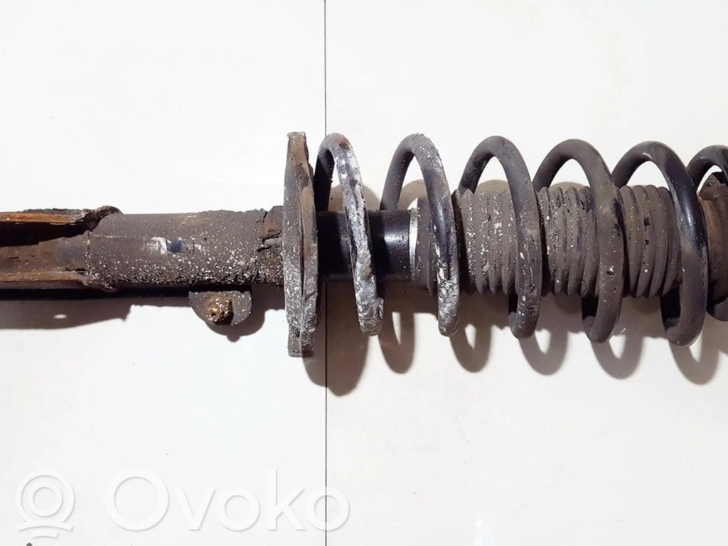 Front coil spring