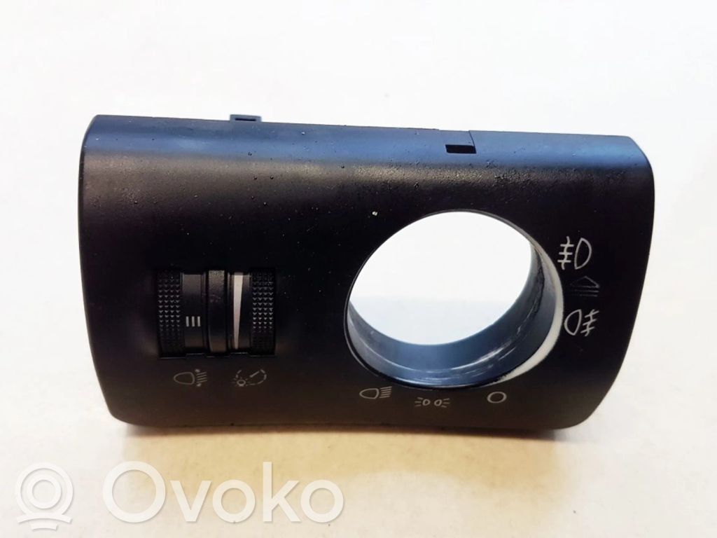 Bouton commande réglage hauteur de phares