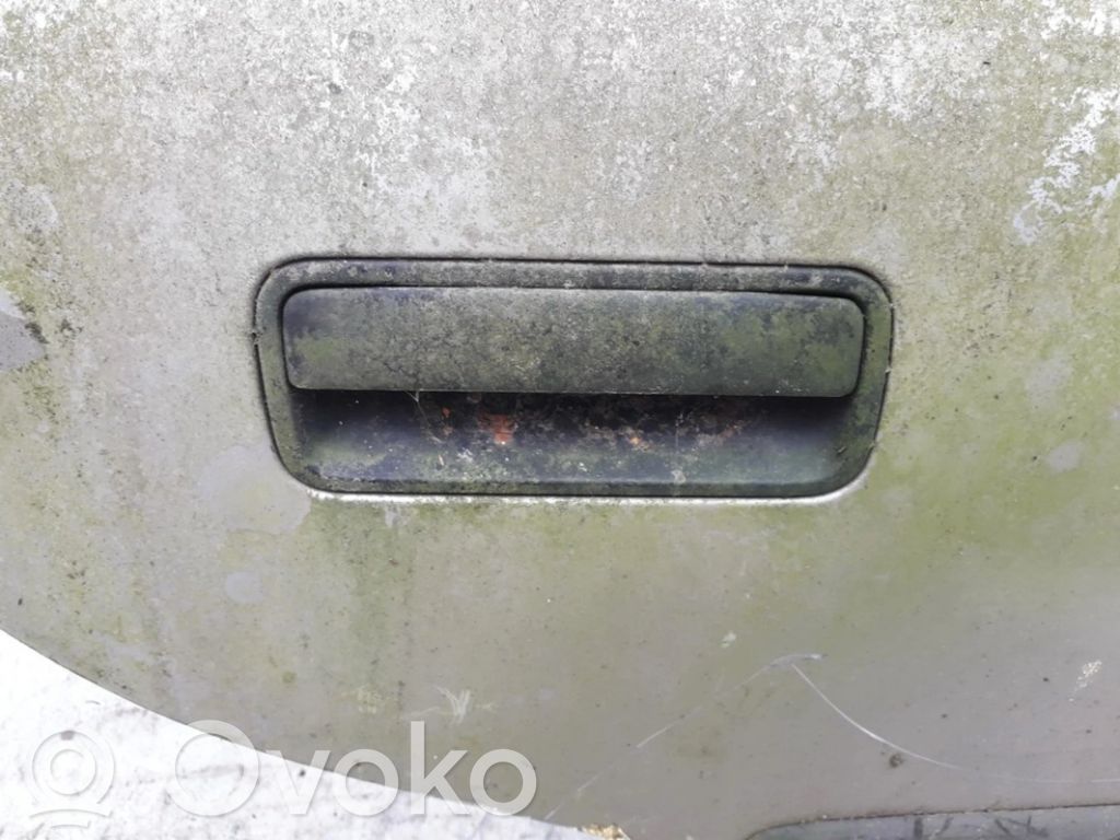 Manecilla externa puerta delantera