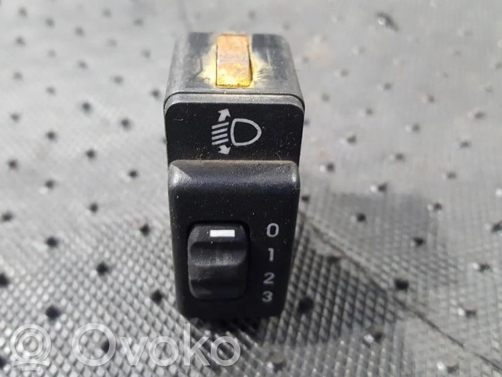 Opel Corsa B Interruttore di regolazione livello altezza dei fari 