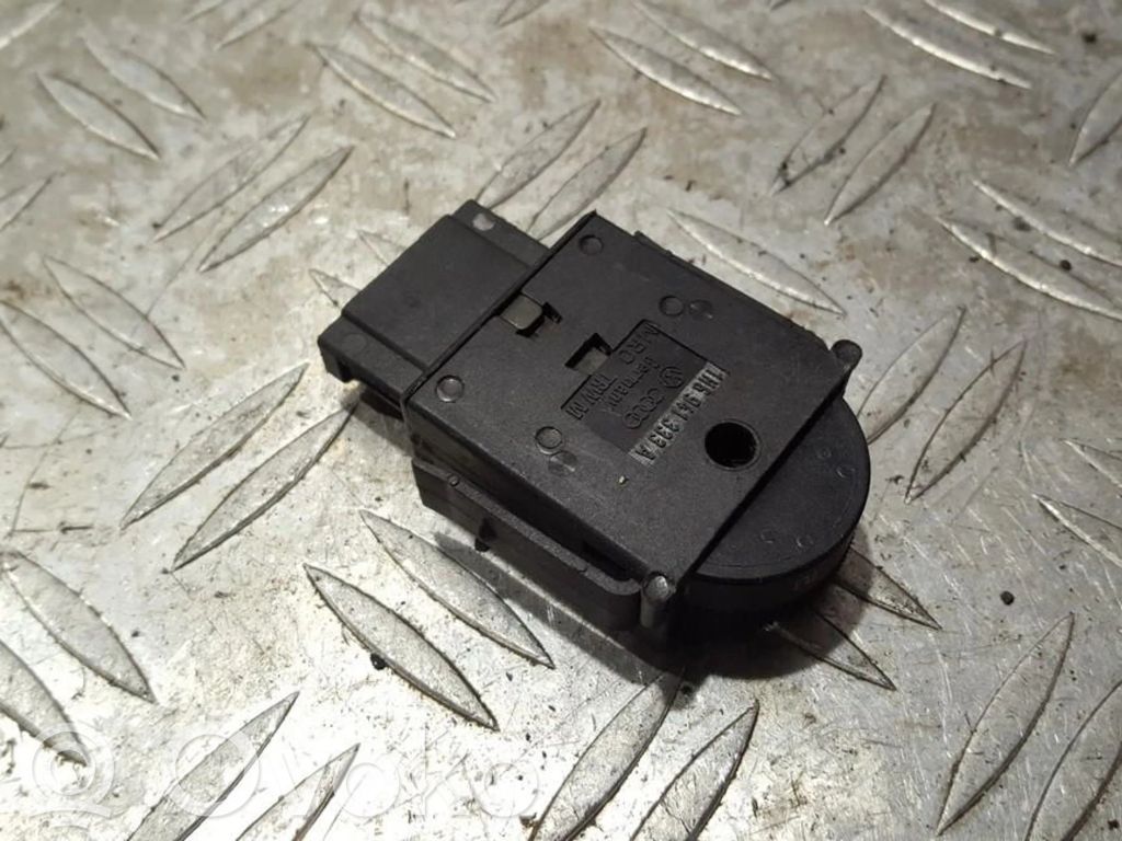 Volkswagen Golf IV Interruptor de control de altura del faro delantero 