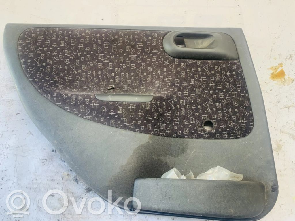 Opel Corsa C Apmušimas galinių durų (obšifke) 