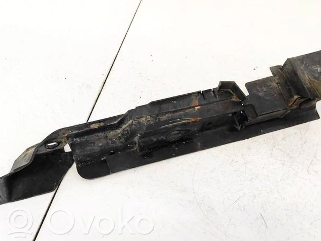 Opel Corsa D Uchwyt / Mocowanie lampy przedniej 