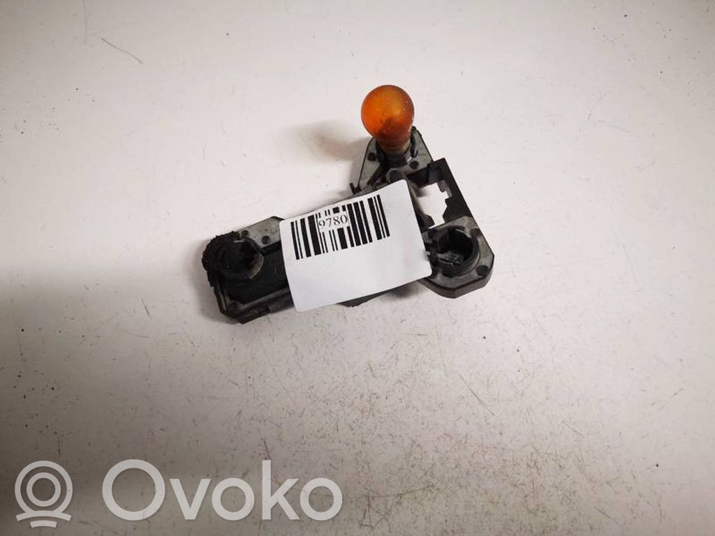 Renault Scenic I Takavalon polttimon suojan pidike 