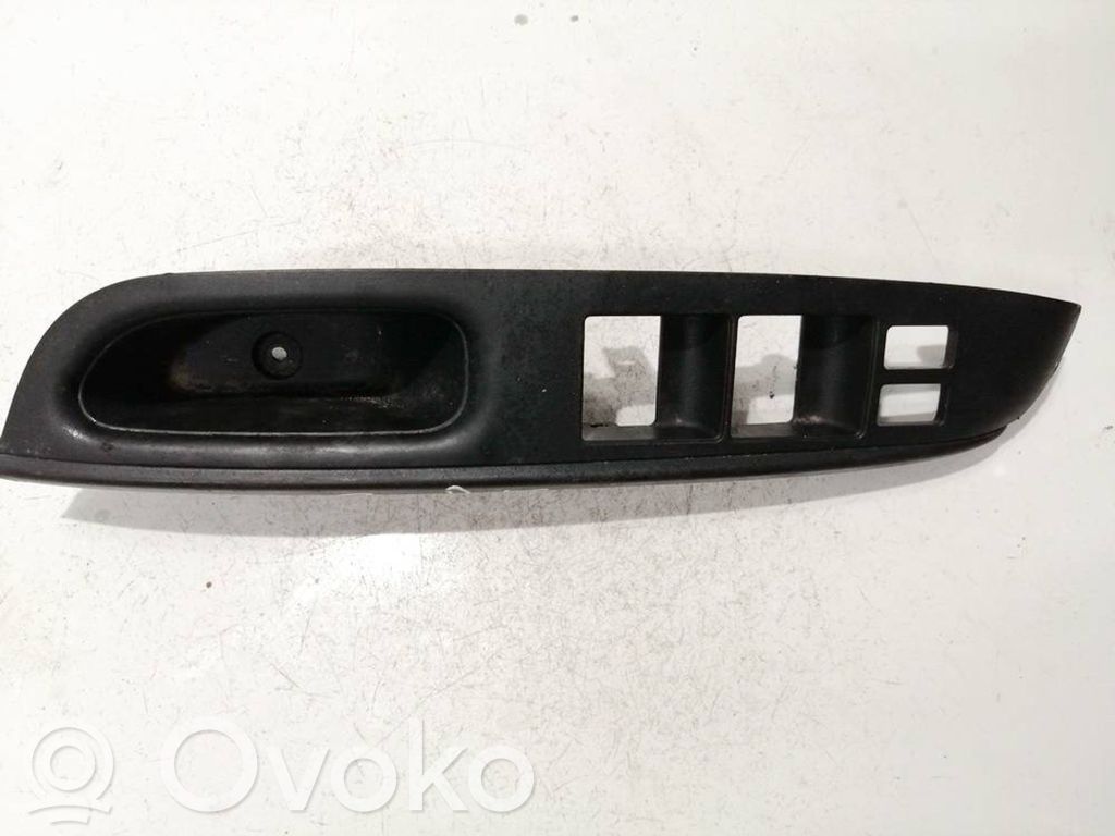 Nissan Note (E12) Front door window switch trim 