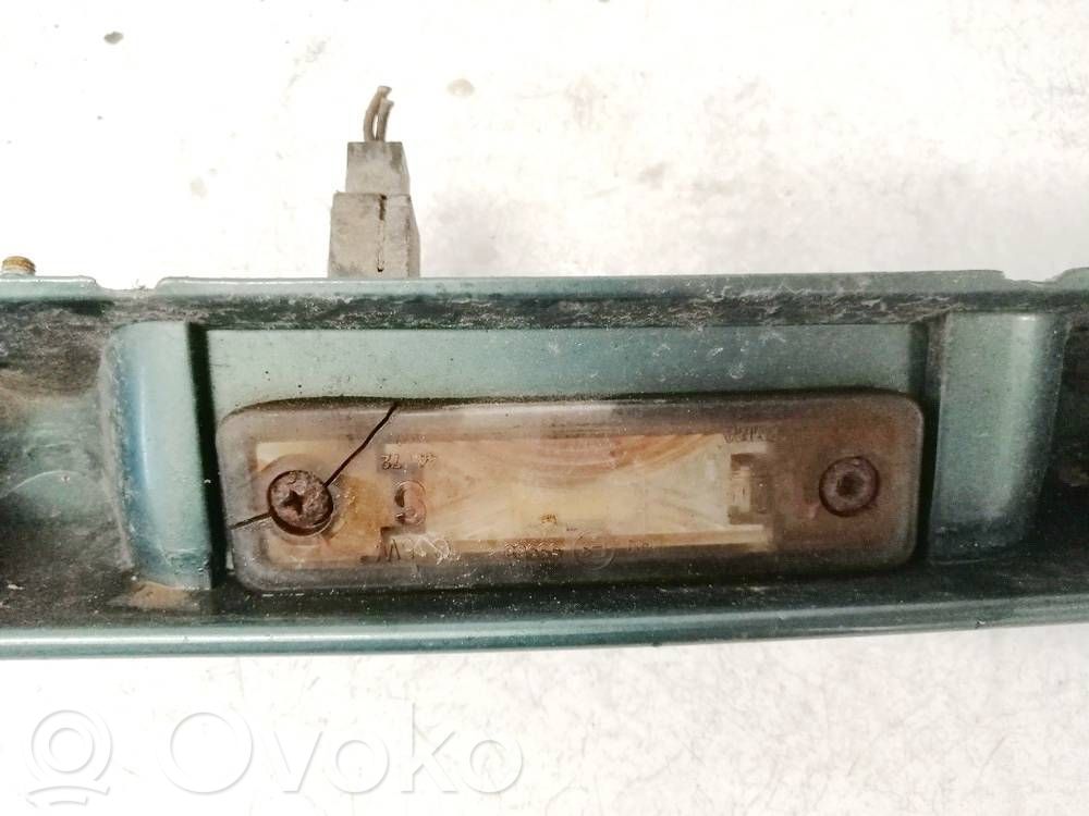 Opel Astra G Lampa oświetlenia tylnej tablicy rejestracyjnej 