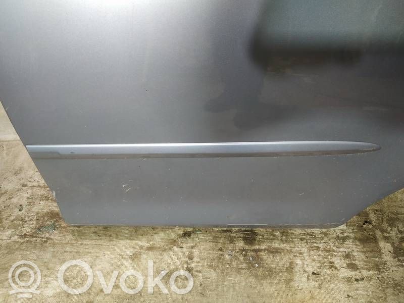 Mazda 2 Mască ușă spate (turnată)