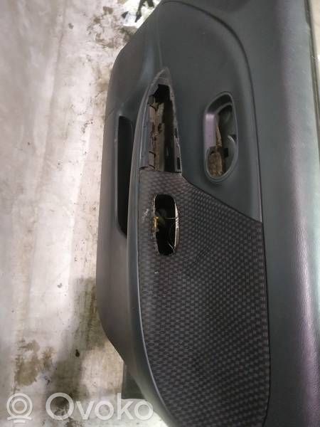 Nissan Note (E11) Panou tapițerie ușă față 