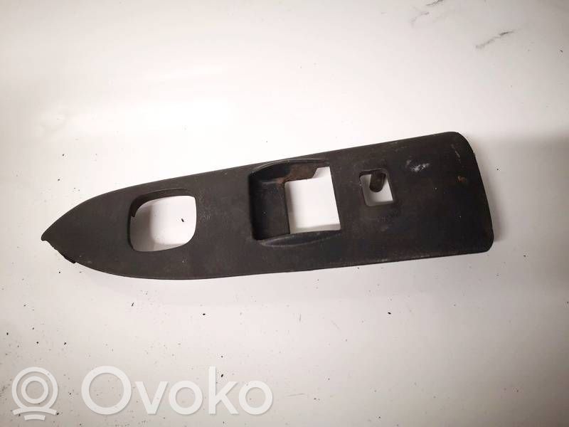 Mazda 626 Front door window switch trim 