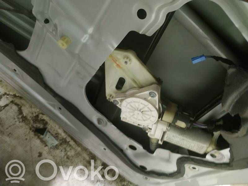 Regulador con motor de la ventanilla de la puerta corredera