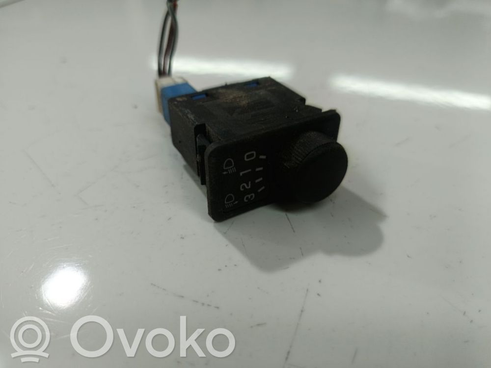 Nissan Primera Przycisk / Pokrętło regulacji świateł 