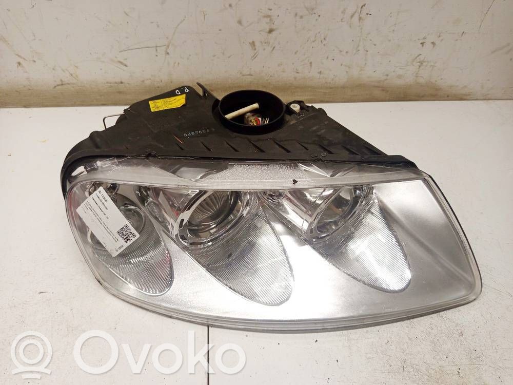 Volkswagen Touareg I Lampa przednia 