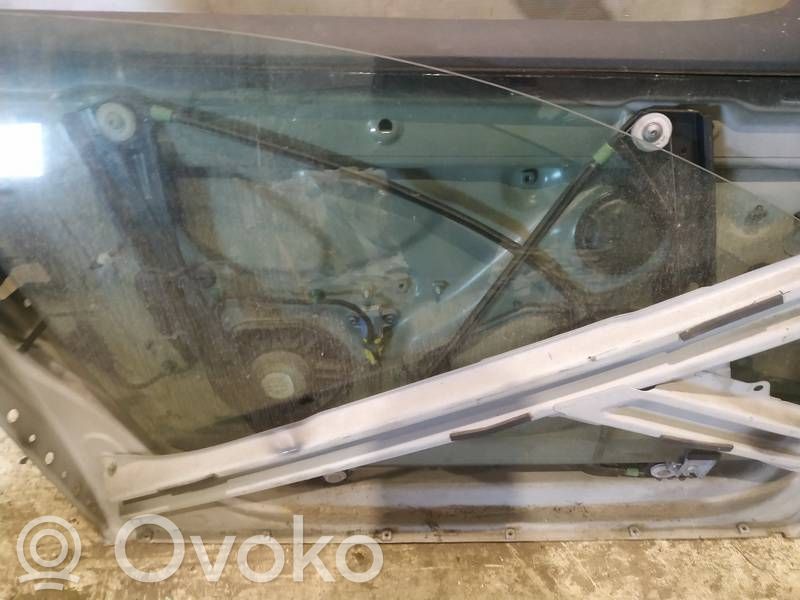 Volkswagen Golf V Vetro del finestrino della portiera anteriore - quattro porte