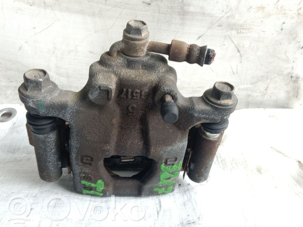 Nissan Qashqai+2 Mocowanie / Zacisk hamulca tylnego 