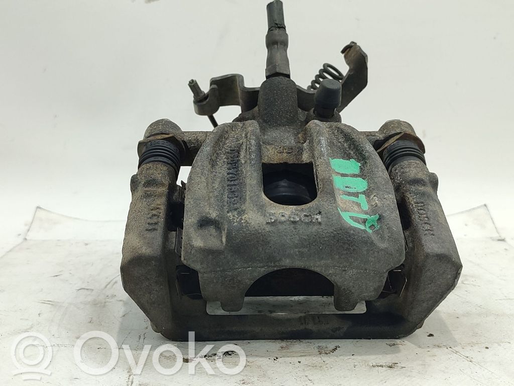 Ford Mondeo Mk III Mocowanie / Zacisk hamulca tylnego 