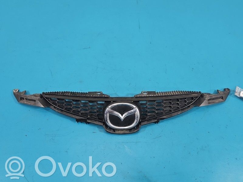 Mazda 2 Front bumper upper radiator grill 