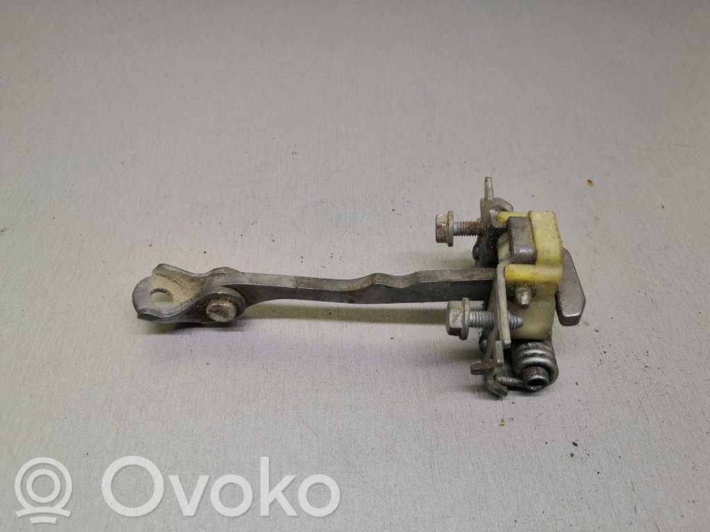Ogranicznik drzwi przednich   000721