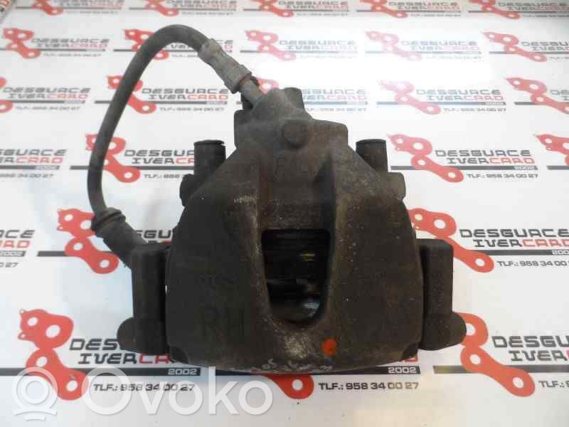Ford Focus Zacisk hamulcowy przedni 