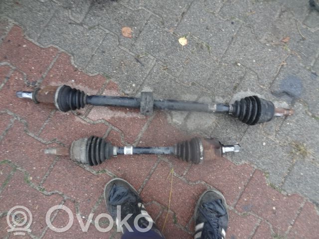 Opel Corsa D Eje de transmisión delantero 